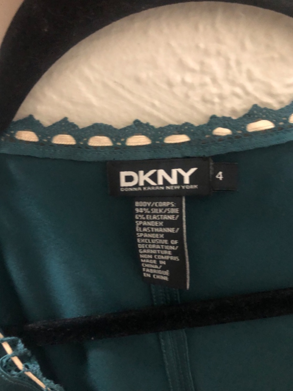 DKNY satin blouse with lace detailing and a V-neckline.Size 4 - Picture 4 of 6